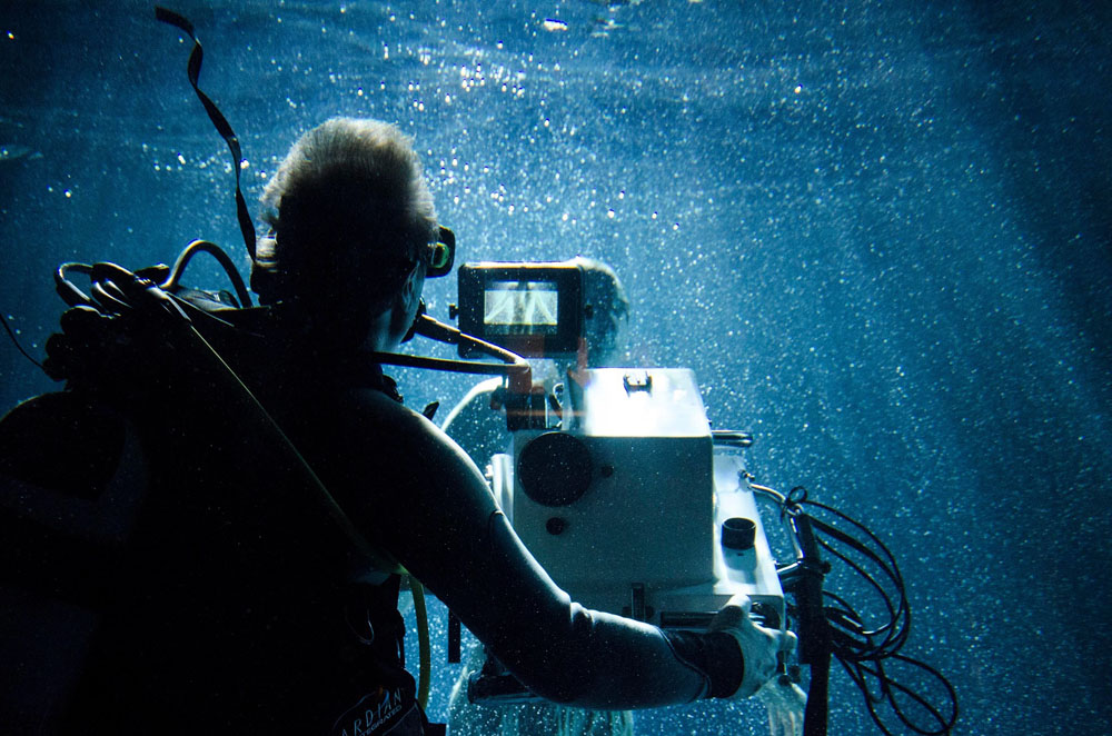 Mike Valentine BSC lines up the shot at the Underwater Stage at Pinewood Studios